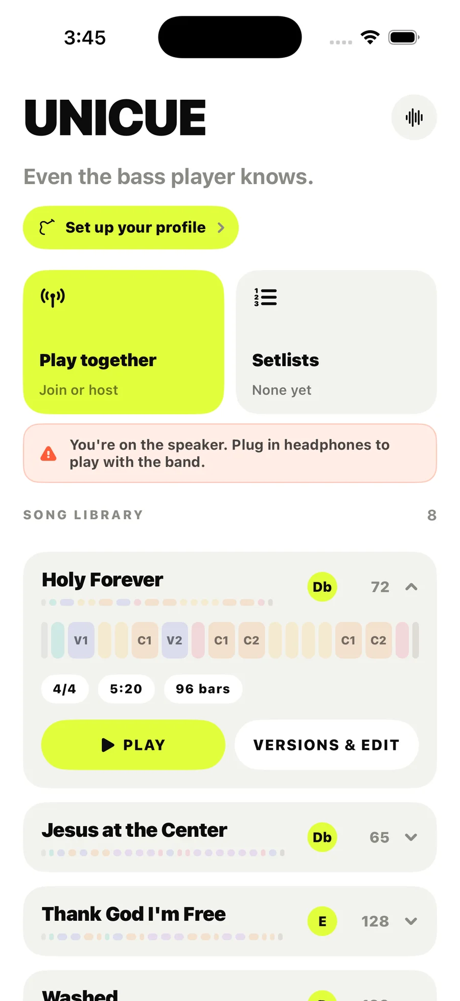 Unicue's home screen with a song library, "Play together" and "Setlists" tiles, and a warning that headphones are needed